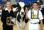 Matt Mitchell, LaFollette, Tenn., receives the Judi Collinsworth Award from Emily Yeiser, Junior Advisory Committee member at the Premier National Junior Holstein Show at the All-American Dairy Show, Harrisburg, Pa.